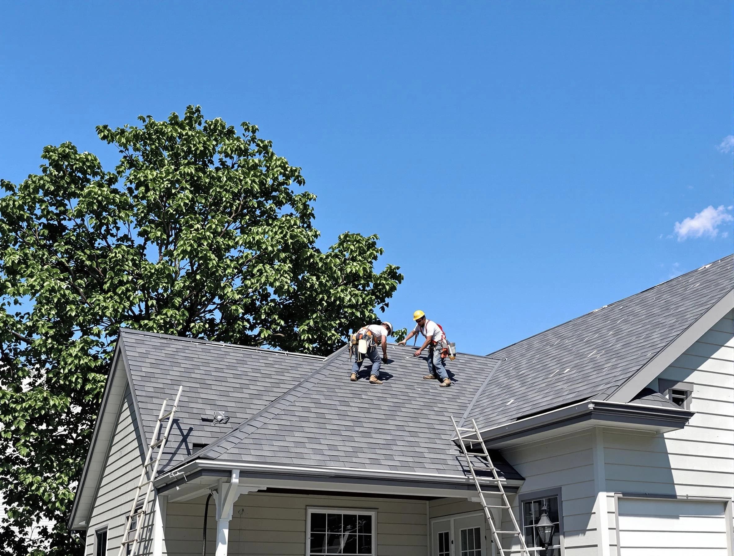 Painesville Roofing Company crew finalizing a roof installation in Painesville, OH